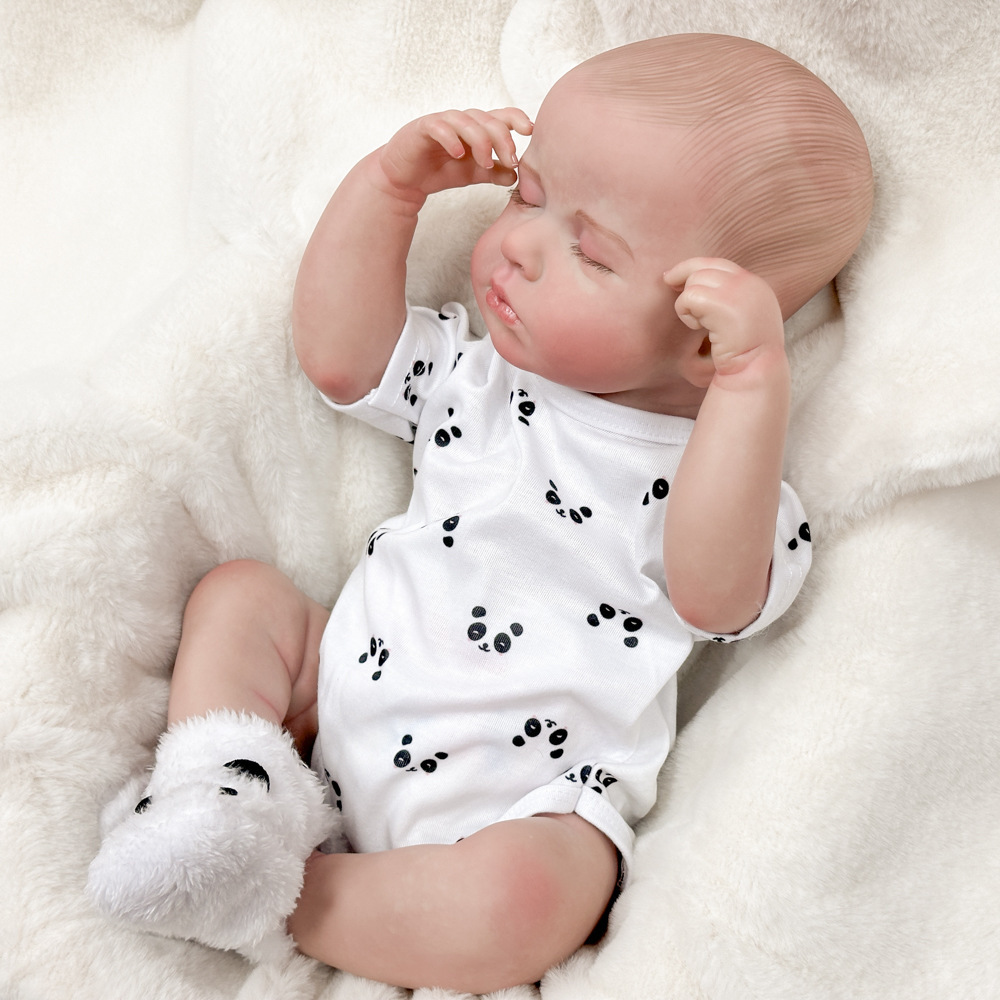 Muñeca de imitación de muñeca de comercio exterior bebé lindo 50 cm bebé pesado cuerpo de tela de alto color transfronterizo