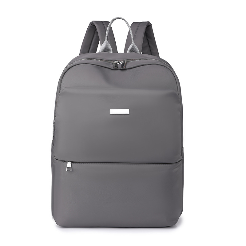 2023 invierno nuevo estilo casual damas mochila de nailon simple y versátil mochila de viaje de negocios de gran capacidad al por mayor