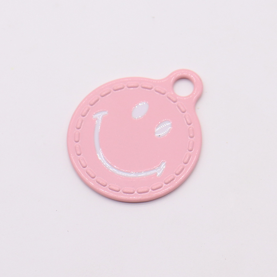 Ventas transfronterizas de color sonriente aleación de pulverización pintada sonrisa dulce colgante DIY auriculares collares joyas accesorios