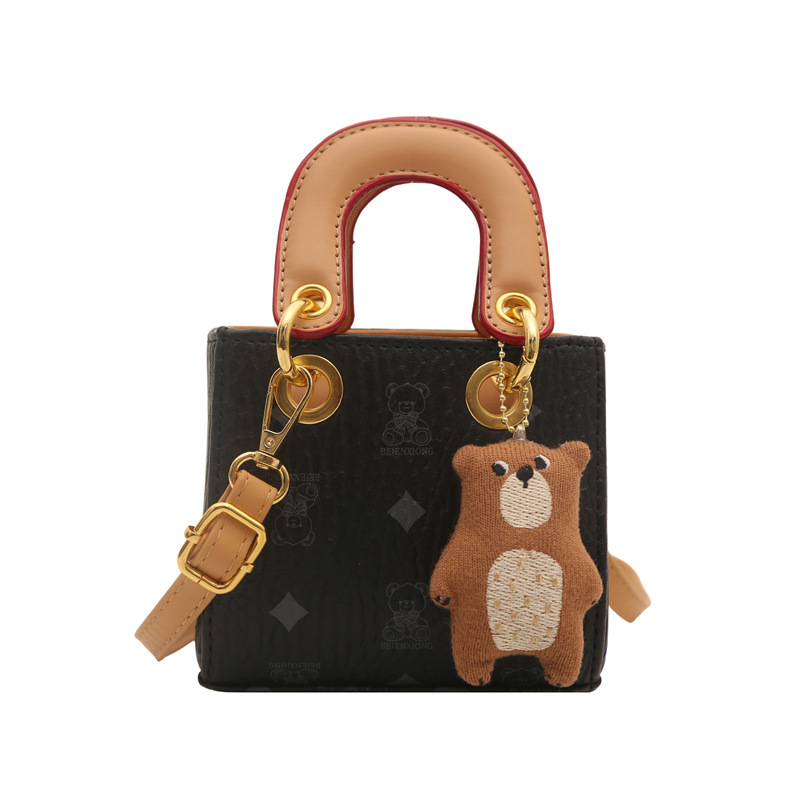 2026 nuevo bolso infantil caricatura lindo oso impresión bolso de hombro de moda mini bolso de bebé