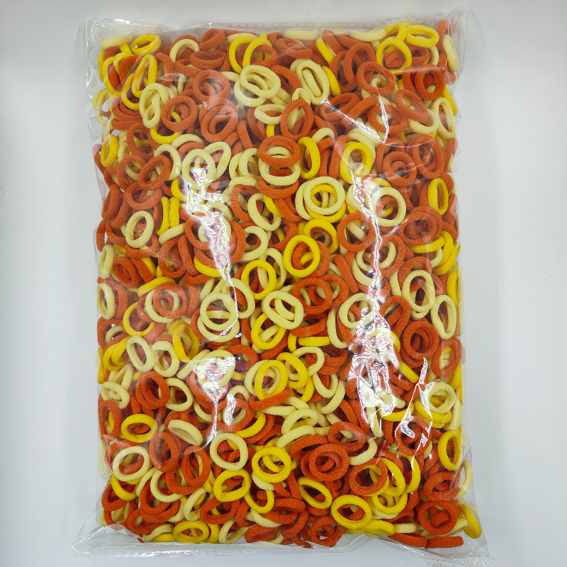 Fábrica directa sin costuras de alta elasticidad cuerda de cabeza para niños anillo de toallas OPP2000 anillo de cabello de cabello para bebés al por mayor