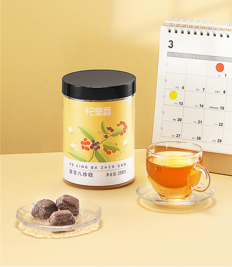 Qilixiang Fu Ling Ba Zhen Gao 250g Jar Ready to Eat Herbal Cake Office Snack in use