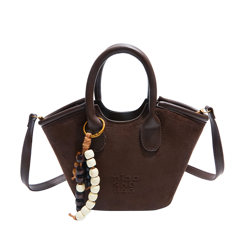 Invierno coreano de seda retro bolso de gran capacidad bolso de mujer 2025 nuevo hombro mochila bolso de cubo de moda