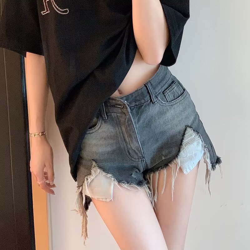 黒灰色の高腰の穴が開いているデニムの半ズボンの女性の夏の新型はゆったりしていて痩せています。|undefined