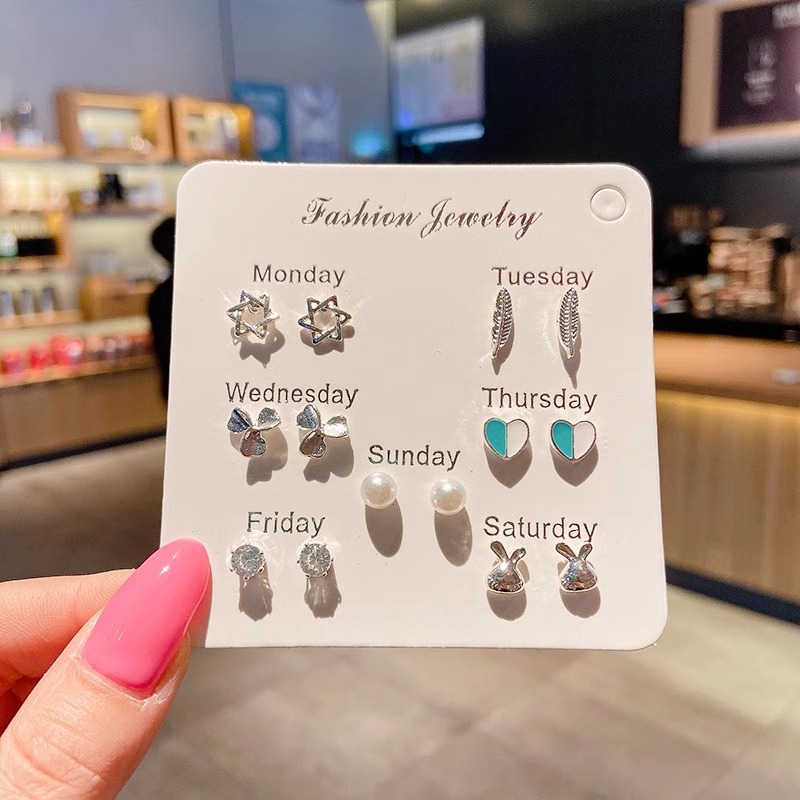 Juego de pendientes 2025 nuevas mujeres de moda simples, compactas, exquisitas, de alta gama, pendientes de celebridades de Internet