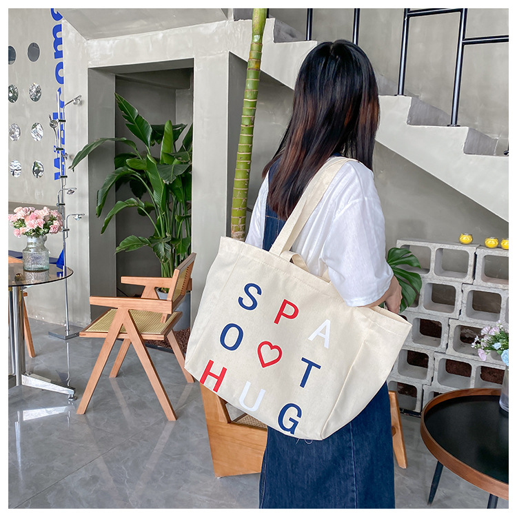 A large-capacity, sturdy Japanese-style canvas bag for women, a new 2022 simple bento handbag for girls to go to work undefined
