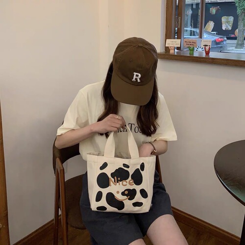 Japanese and Korean style lunch box, work bag, original cow pattern canvas bag, forest style small shoulder bag, lunch bag, ins high value