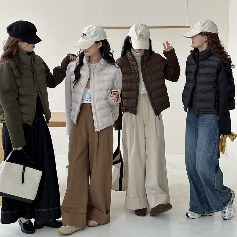 2024 nuevo producto negro ligero invierno Europa y América transfronterizas mujeres urbanas casuales manga larga empalmado abrigo de plumón