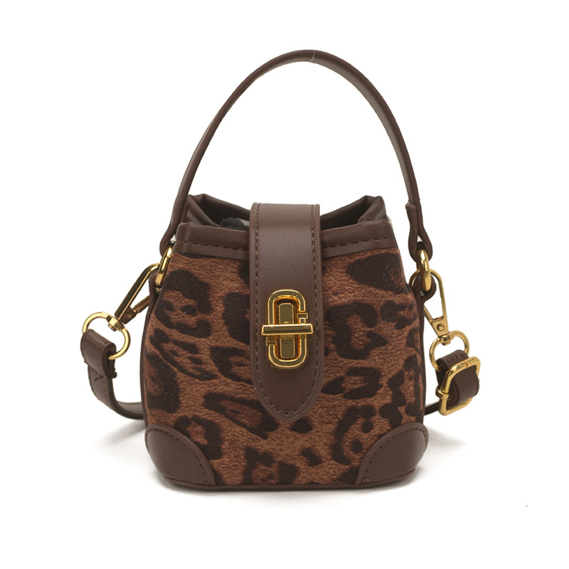 2026 nuevo paquete de hombro para niños con estampado de leopardo extranjero bolsos de mochila para hombres y mujeres, bolsos populares de moda coreana