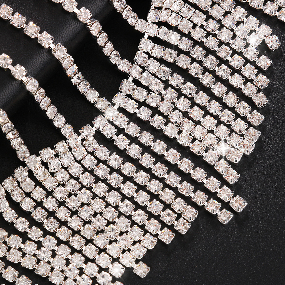 Nueva moda borla Cadena de pelo europeo y americano sexy exagerado rhinestone borla pelo neto tocado todo-fósforo cadena de la joyería