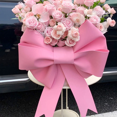 メーカー直販のクリスマス蝶結びEVA材料は結婚の背景壁を包んでいます。