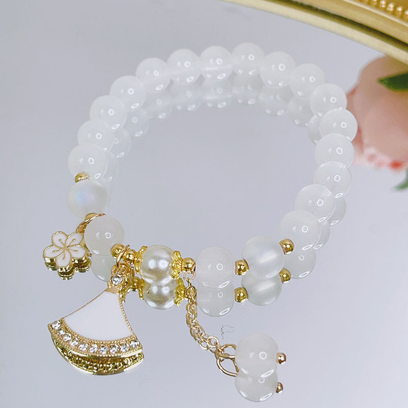 thumbnail image 1 of Pulsera de cristal para estudiantes de primavera y verano, pulsera de cuentas sencilla y bonita para mujer, decoración de mano, falda blanca a, 1 of 2