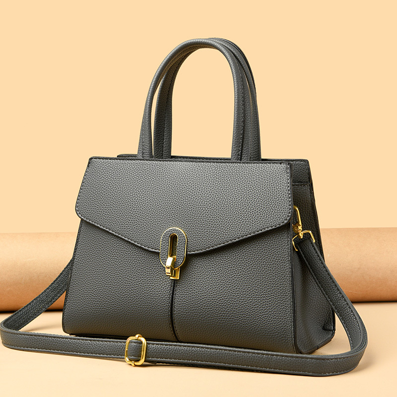 Bolso DE LA MADRE 2023 nuevo bolso de la madre portátil de alto grado de las mujeres de mediana edad elegantes simples de la capacidad grande