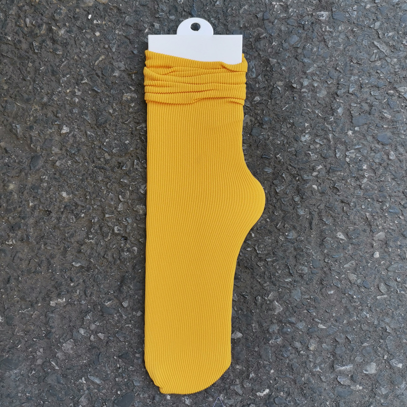 Primavera y verano calcetines de algodón peinados delgados calcetines de confinamiento sin hueso anti-pilling calcetines de moda casual transpirable de color sólido calcetines de pila al por mayor