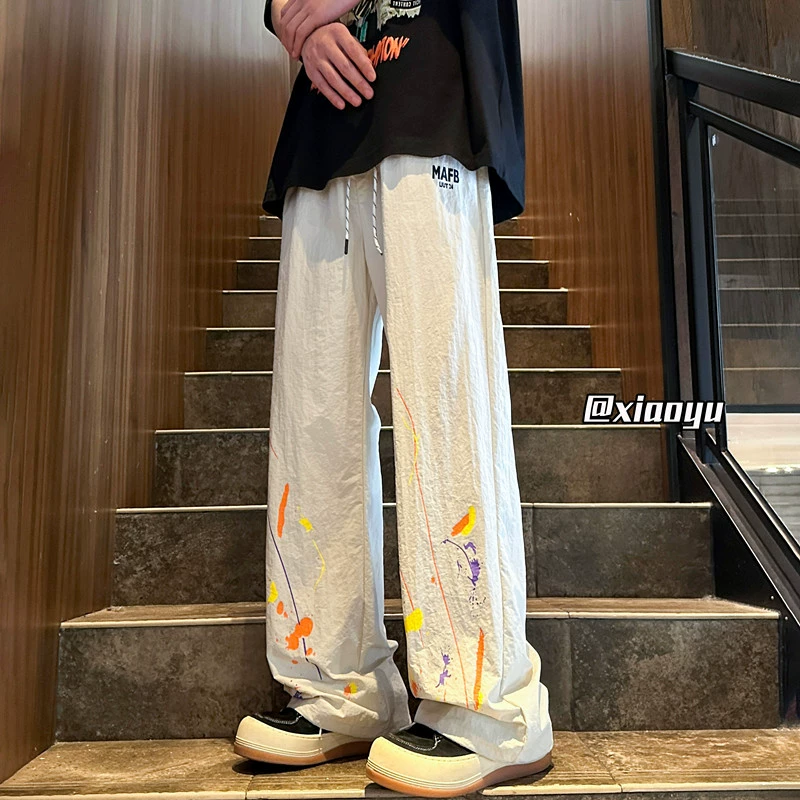 2024 Летние новые дикие брызги быстрорежимные брюки повседневные брюки модные свободные волосы