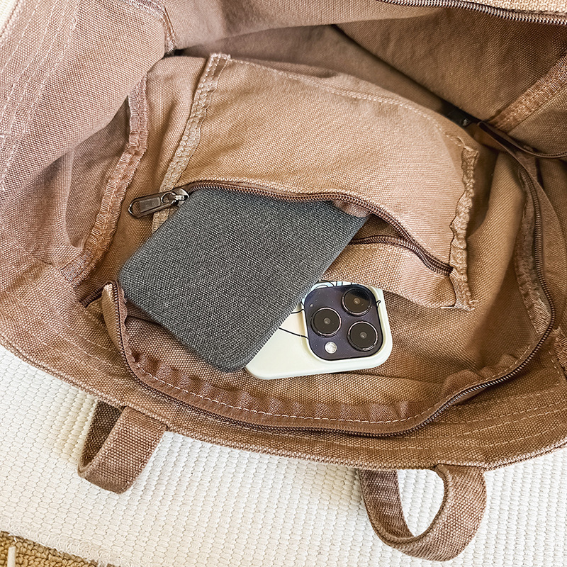 Bolso tote de lona de color sólido retro de gran capacidad de viento perezoso 2025 nuevo bolso de hombro simple de moda al por mayor