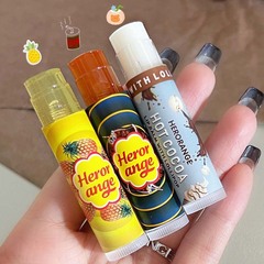 Herorange百味のロリポップ保湿リップクリームは潤いを与えて水を補います。