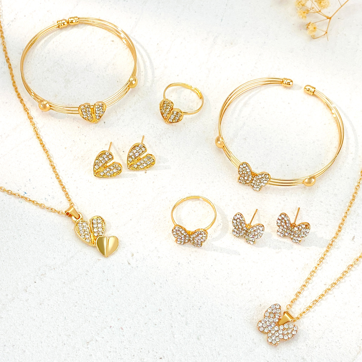 Nuevo diamante transfronterizo mariposa amor joyería traje ins estilo europeo y americano diseño creativo collar en forma de corazón conjunto de cuatro piezas