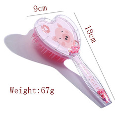 Hot selling cute plastic heart-shaped transparent comb children's hairdressing comb cartoon smooth hair comb logo
