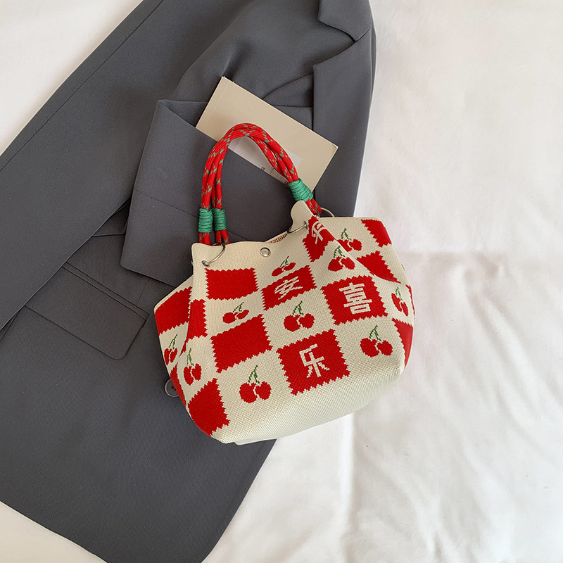 Bolsa de impresión coreana de niña nicho bolso de cubo de diseño diario versátil bolso de mano para estudiantes de viaje diario