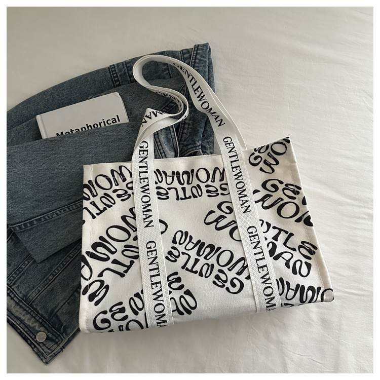Large-capacity letter canvas bag 2025 new style ins printed versatile shoulder bag for commuting and portable ladies' tote bag undefined