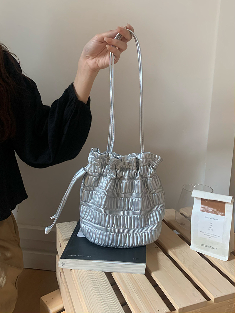 Korean INS niche design, gentle soft leather pleated drawstring bucket bag, one shoulder fashionable texture, silver_voghion.com