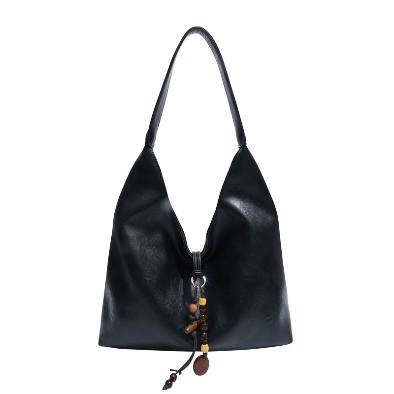 2025 invierno nuevo estilo de alta calidad bolsas de brazo coreanas de moda de gran capacidad bolsas de mano bolsas de hombro retro de viaje de mujer