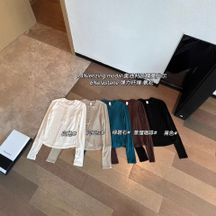 032125   秋季新品女士大弹力瑜伽运动纽扣长袖T恤打底衫