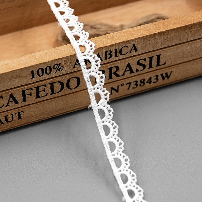 多龍ミルク糸透かし彫り水溶レース補助材料犬歯辺ロリータスカート刺繍織物生地