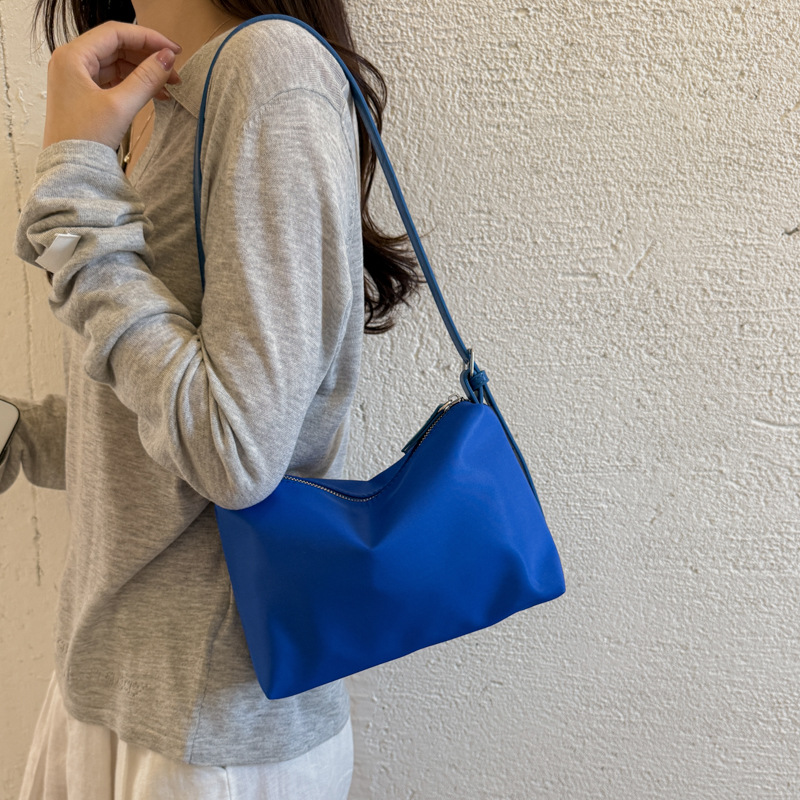 Nicho coreano universal bolso pequeño ligero para mujeres 2026 verano minimalista viaje diario ocio mochila de hombro