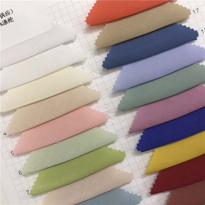天丝铜氨梭织面料40个颜色现货供应厂家直销衬衣套装面料342744