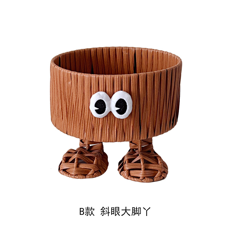 Pies grandes imitan la canasta redonda de Ratán con ojos oblicuos