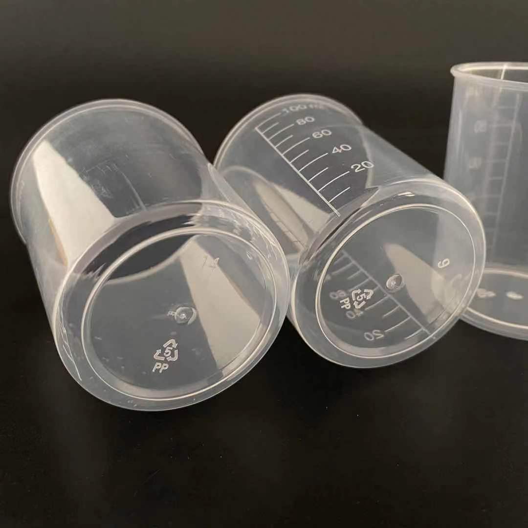 Taza de medición al por mayor 50 ml Taza de medición de plástico 100 ml Taza de precipitados de plástico con taza de plástico graduada