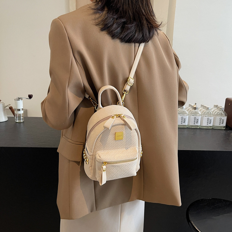 Mochila coreana de moda de estilo extranjero para mujeres simple color sólido bolso portátil de mujer 2025 nueva mochila de estudiantes de comercio exterior