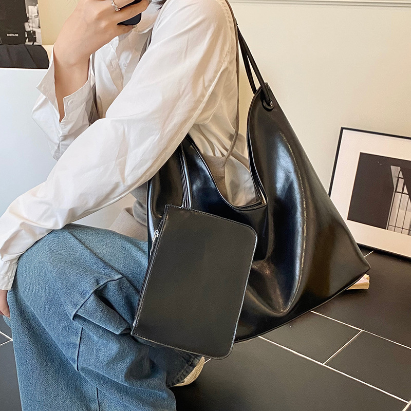 Nuevos productos transfronterizos más vendidos Bolso de cuero suave para axilas para mujer 2025 Modelo súper caliente Bolso de hombro de gran capacidad de viento perezoso