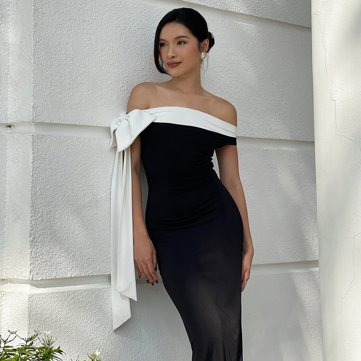 Estilo europeo y americano ropa de mujer transfronteriza otoño e invierno nueva moda temperamento tirantes de un solo hombro sin mangas bolso delgado vestido de cadera mujeres image 4