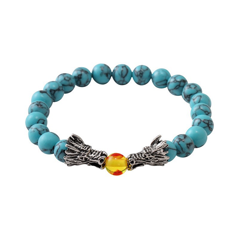 Suministro de comercio exterior joyería moda simple piedra volcánica de 8mm blanco turquesa pulsera de cristal amarillo pulsera de grifo pulsera al por mayor