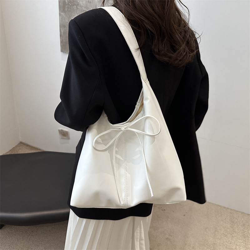 Bolsa de brazo coreana de gran capacidad para mujeres 2024 otoño y invierno nueva textura bolsa de hombro de gran capacidad