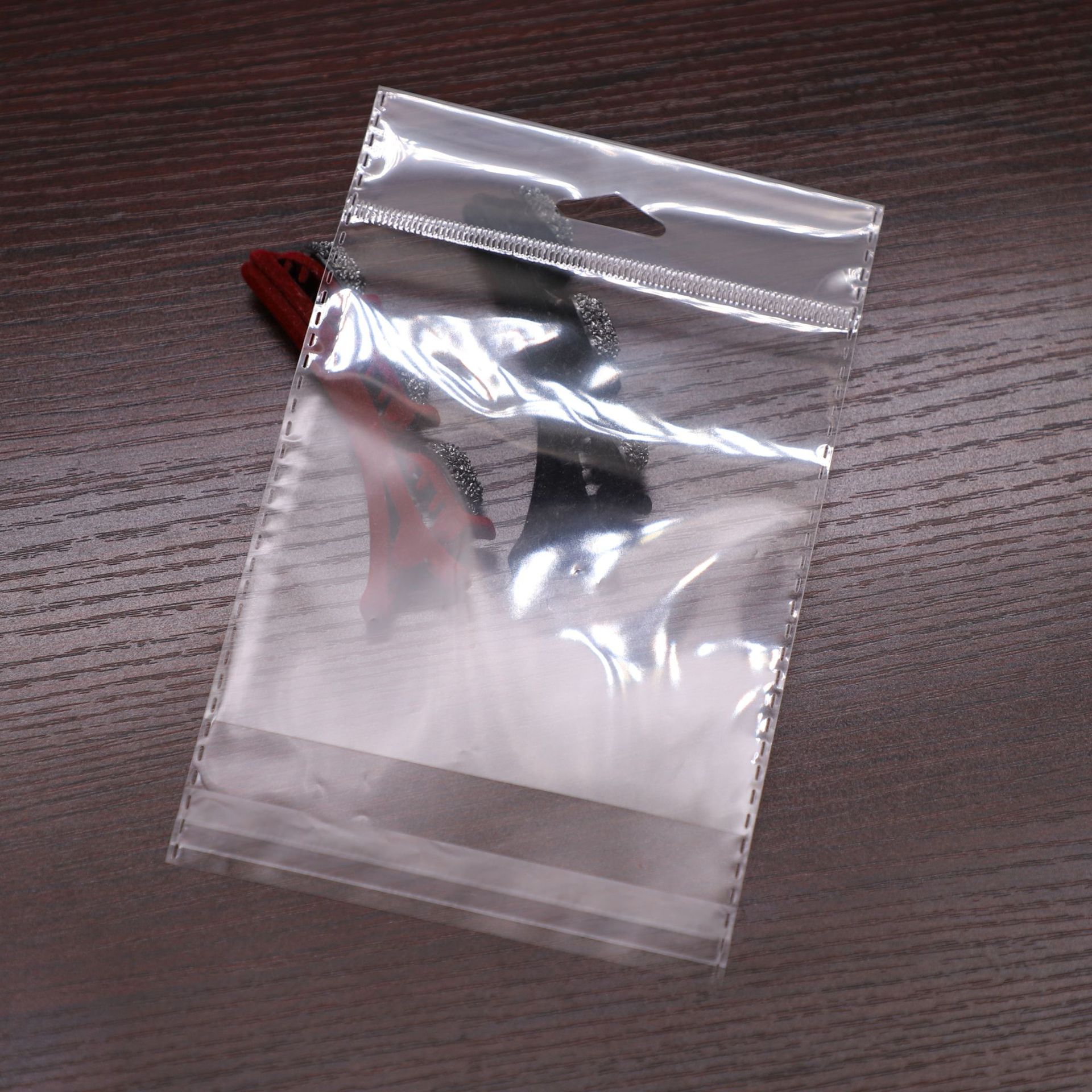 防爆边加厚全透明OPP卡头自粘袋三角孔飞机孔花边手串皮筋挂孔袋