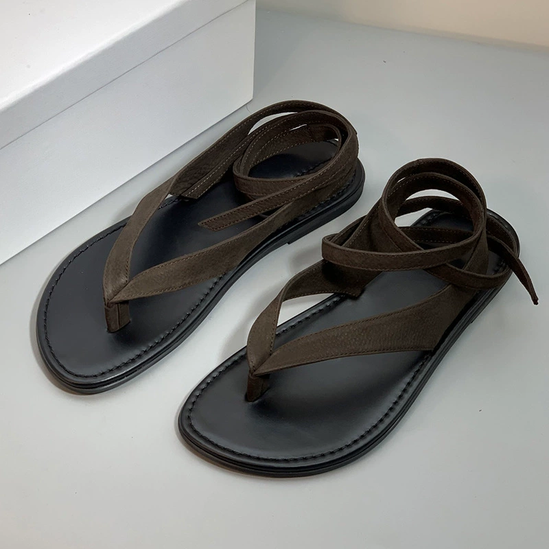 European station flat-sole wrapping belt Roman sandals the outside wear genuine leather open-toe clip flip-flops vacation sandals trend