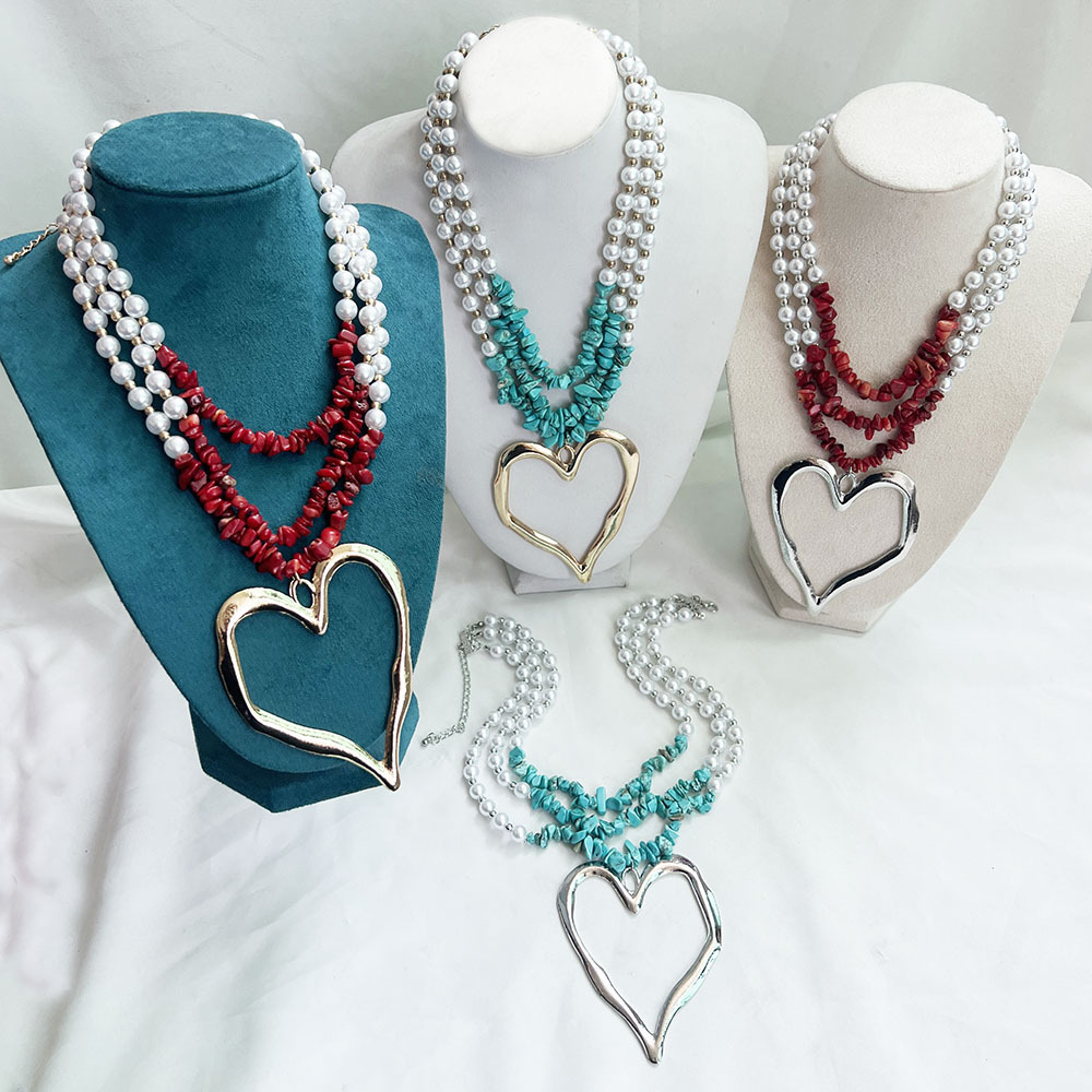 85g Weight Alloy Pendant Material Three Layer Necklace Classification Imitation Pearl Chain Material Beaded Chain Chain Type 1 Piece Quantity Casual, Party Occasion Imitation Pearl, Alloy Material Heart Shape Pattern Unisex Gender Exaggerated, Streetwear Style Exaggerated Streetwear Heart Shape Imitation Pearl Alloy Beaded Chain Statement Necklaces Wholesale 3