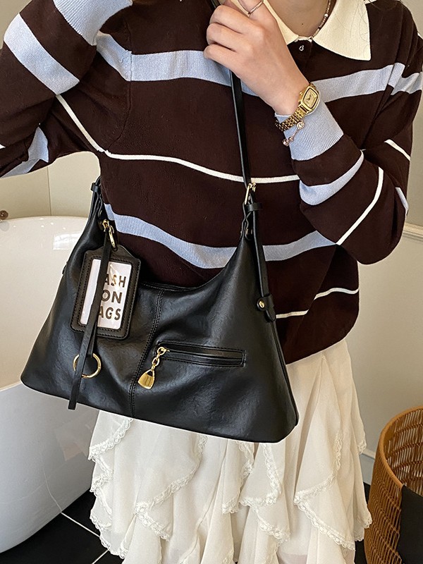 Bolsas retro de gran capacidad para mujeres 2026 nuevo estilo coreano de ocio de hombro con bolsas de brazalete inclinadas para viajar bolsas de mano simples