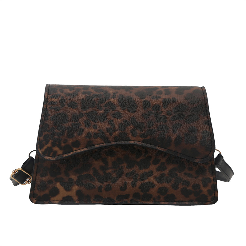 Bagos de brazo estampados de leopardo de estilo extranjero mujeres 2025 primavera de moda europea y americana retro viaje bolso de hombro bolso de forma pequeña