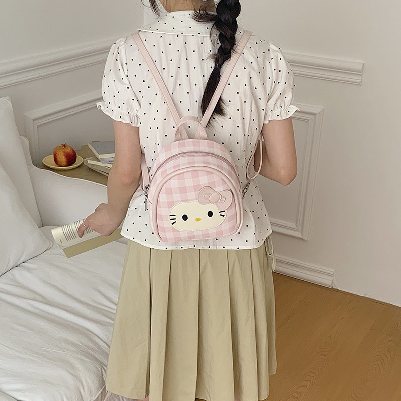 Cat2026 viento de verano mochila de chicas mini mochila encantadora para mujeres punto de onda diario púrpura versátil nuevo