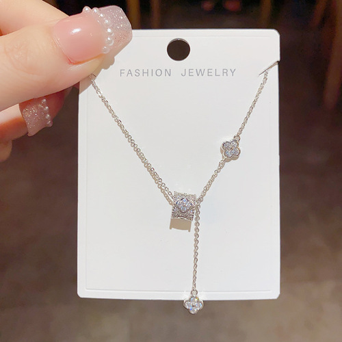 Light luxury niche design, high-end, small waist, four-leaf flower necklace, tassel, sweet temperament, fashionable and versatile clavicle chain