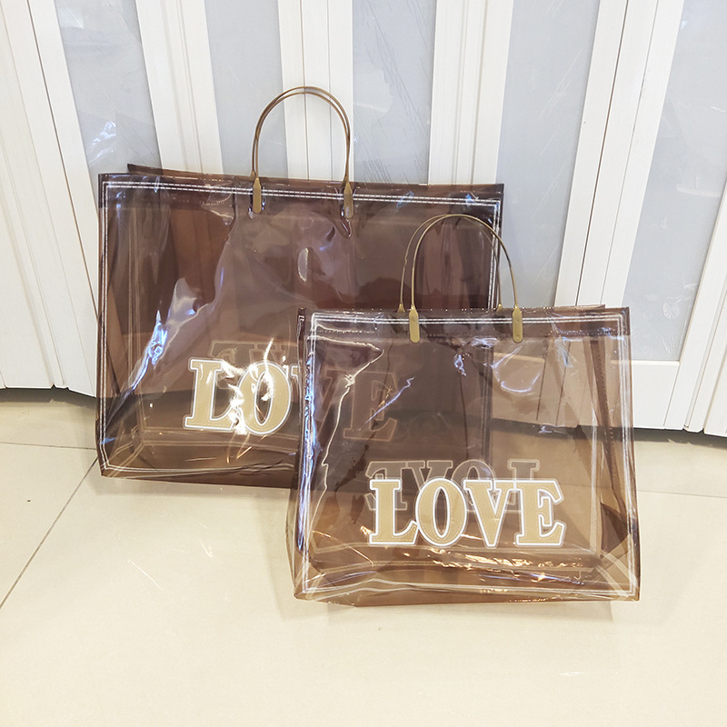 love叉耳袋礼品包装服装店手提袋化妆品店透明手挽袋加厚定logo