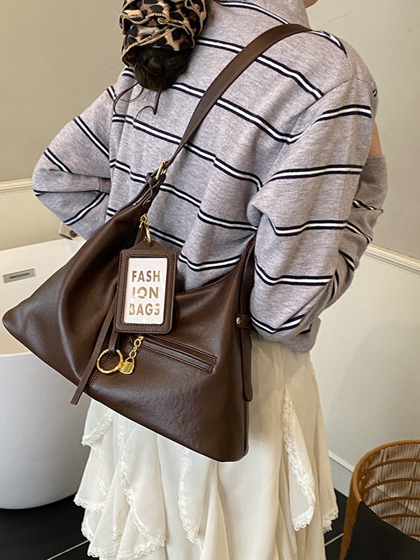 Bolsas retro de gran capacidad para mujeres 2026 nuevo estilo coreano de ocio de hombro con bolsas de brazalete inclinadas para viajar bolsas de mano simples