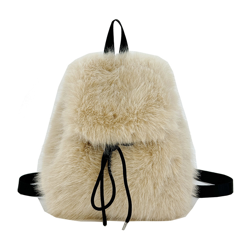 Mochila de pelúcia de color sólido para mujeres de alta calidad de moda bolsas de lana de cuerda de tracción de otoño y invierno 2025 nueva mochila de damas de comercio exterior