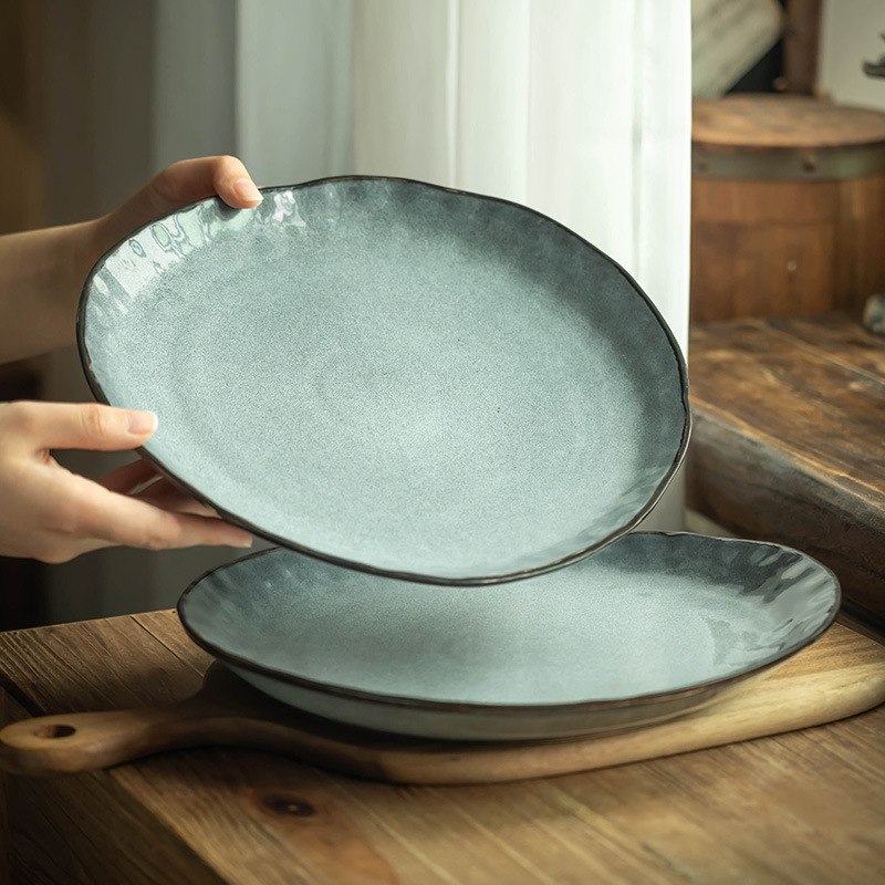 Plato de cerámica retro creativo plato irregular platos de platos caseros cubiertos de filete platos de nicho platos al por mayor