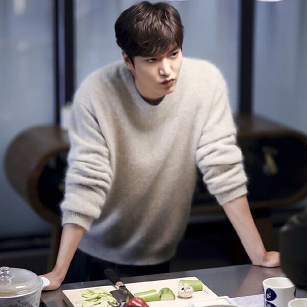 Demi-season solid woolen knitted base sweater with a round collar